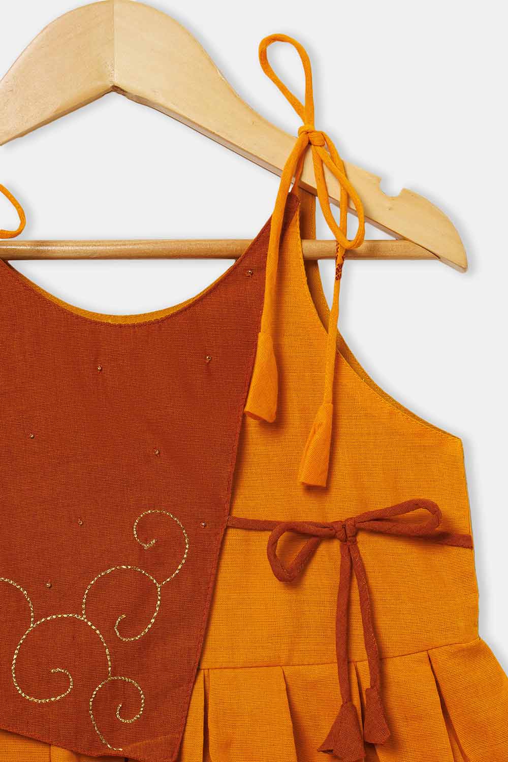 Chittythalli Girls’ Ethnic Frock – Sleeveless with Asymmetric Contrast Panel, Box Pleats & Zari Embroidery - Orange - FR41