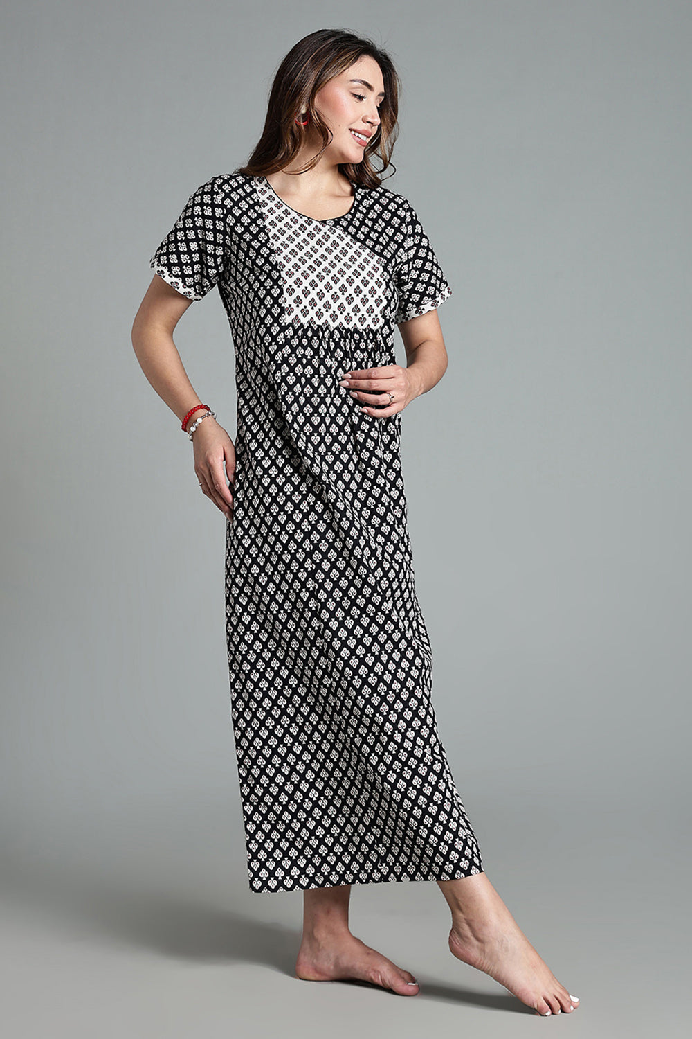 Naidu Hall Women’s Full-Length Cotton Nighty – Scoop Neck with V-Slit, Contrast Patch Yoke & Floral Butta Print
- Black - NA34