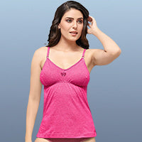 Woman wearing a pink bra slip with thin straps
