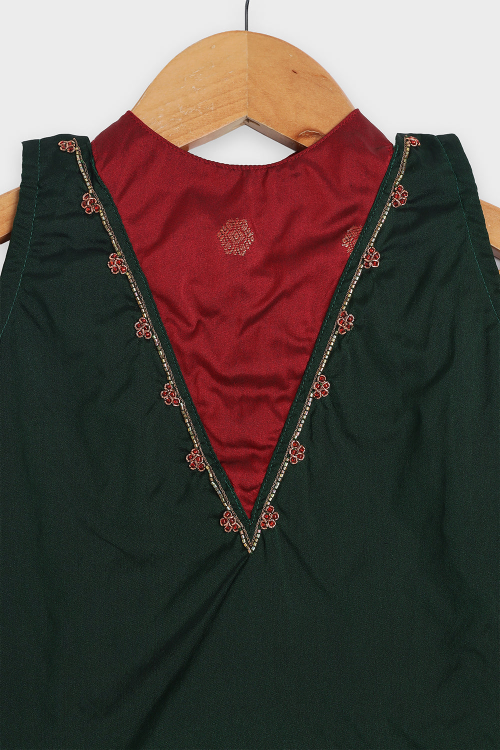 Chittythalli Girls Traditional Pavadai Set | Art Silk Green Sleeveless Top with Red Neck Tie Panel | Minimal Embroidery Hemline | Maroon Knife Pleated Skirt | Woven Ethnic Wear for Girls - PS008