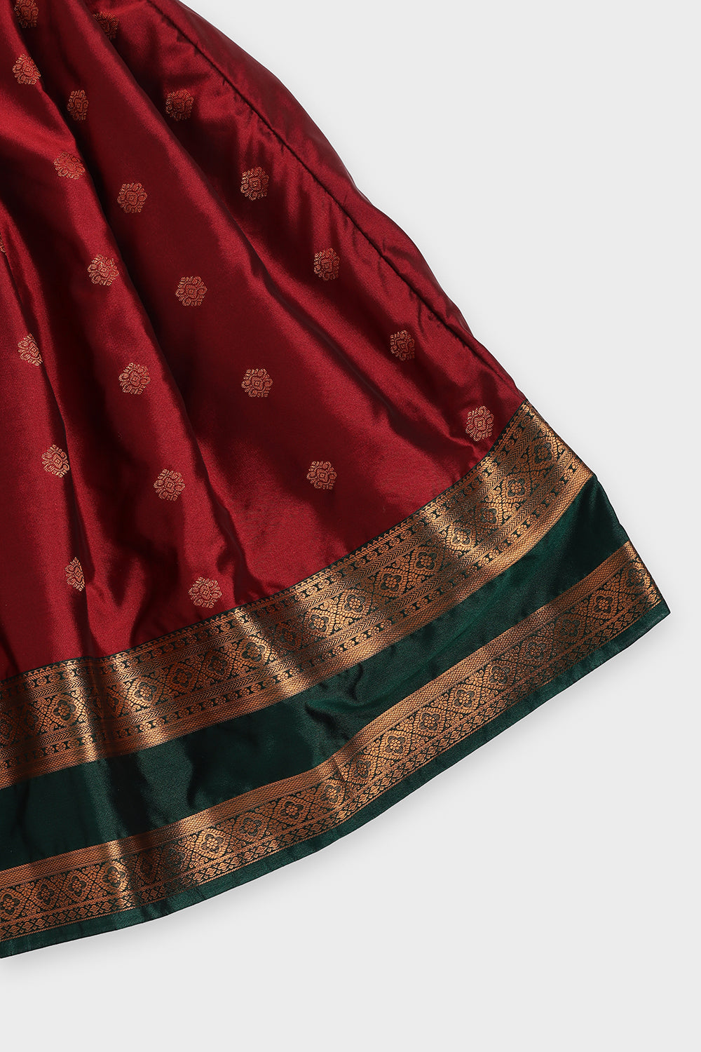 Chittythalli Girls Traditional Pavadai Set | Art Silk Green Sleeveless Top with Red Neck Tie Panel | Minimal Embroidery Hemline | Maroon Knife Pleated Skirt | Woven Ethnic Wear for Girls - PS008
