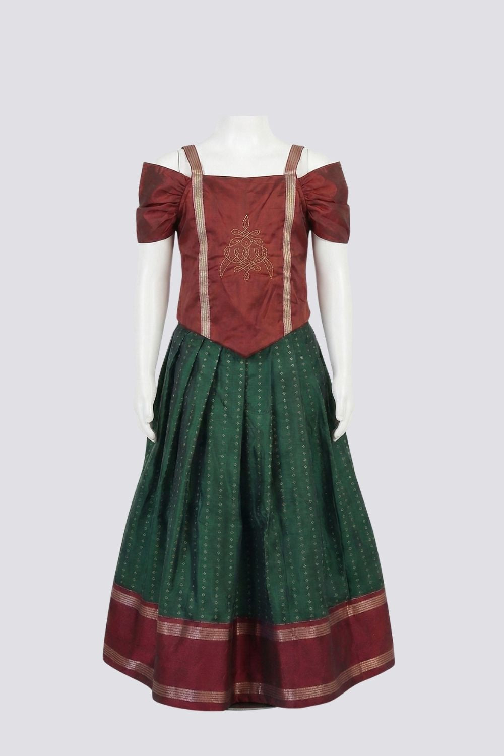 Chittythalli Girls Traditional Pavadai Set | Art Silk V-Cut Maroon Top with Gathered Cold Shoulder Sleeves & Kolam Motif Embroidery | Green Knife Pleated Skirt | Back Open Gold Button | Woven Ethnic Wear for Girls - PS005