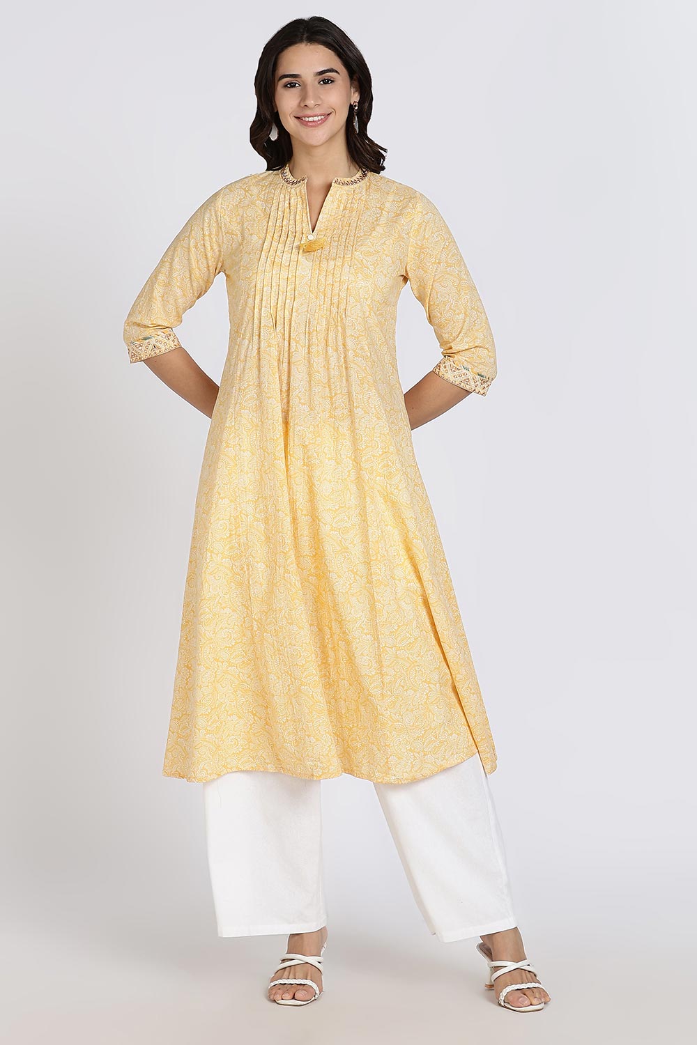 Mythri Women’s Cotton Cambric Kurthi | Flared Ethnic Wear with Pintucks, V-Slit Neck & Tassel Detail - Yellow - K806