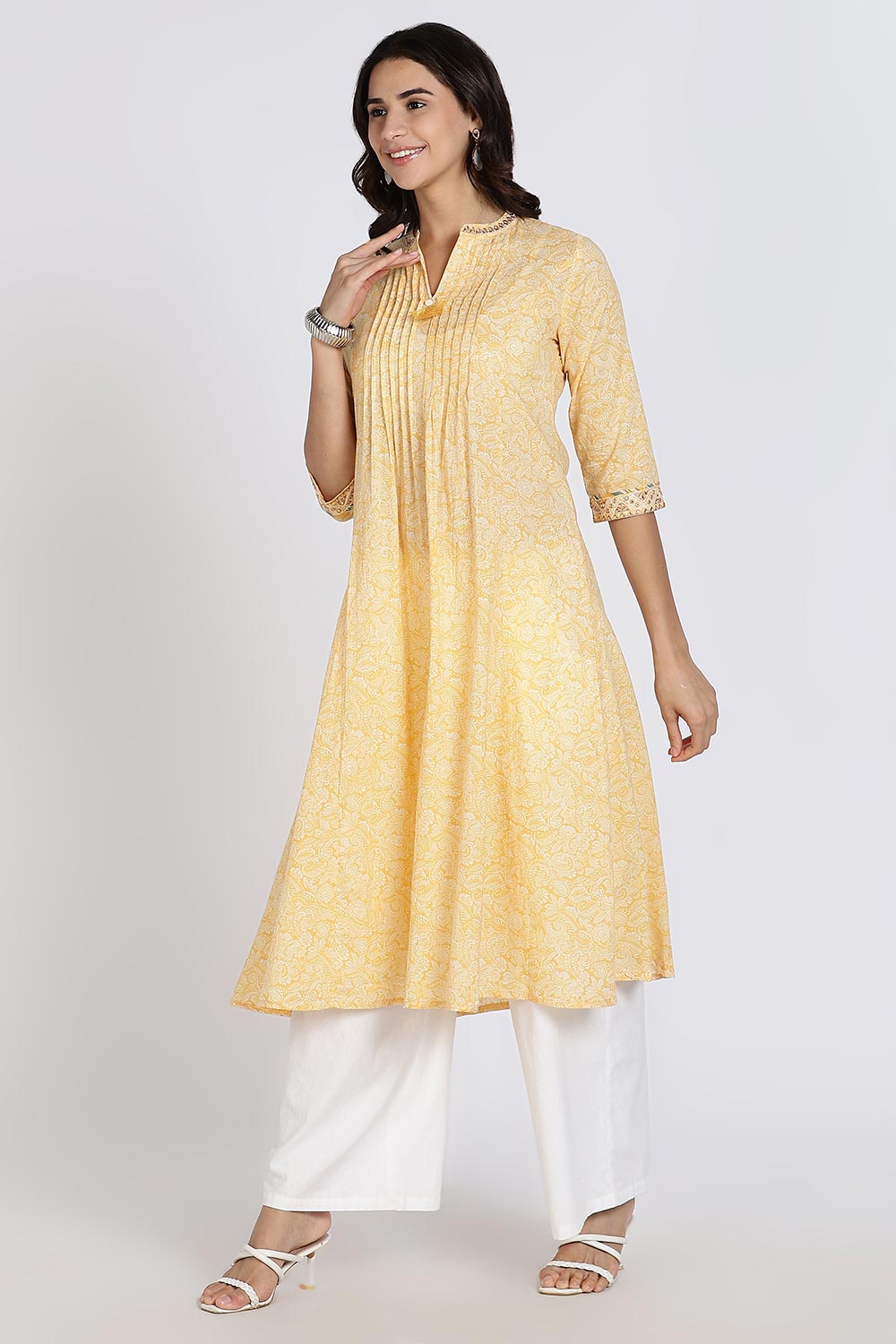 Mythri Women’s Cotton Cambric Kurthi | Flared Ethnic Wear with Pintucks, V-Slit Neck & Tassel Detail - Yellow - K806