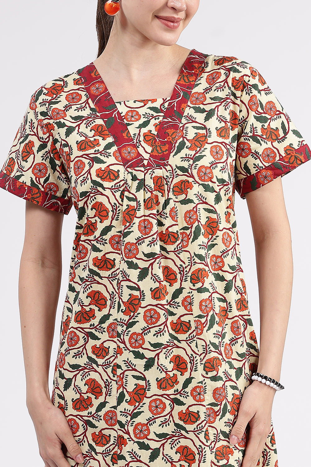 Naidu Hall Women’s Printed Cotton Full-Length Nighty with V-Neck Patchwork and Contrast Border Sleeves
- NA98