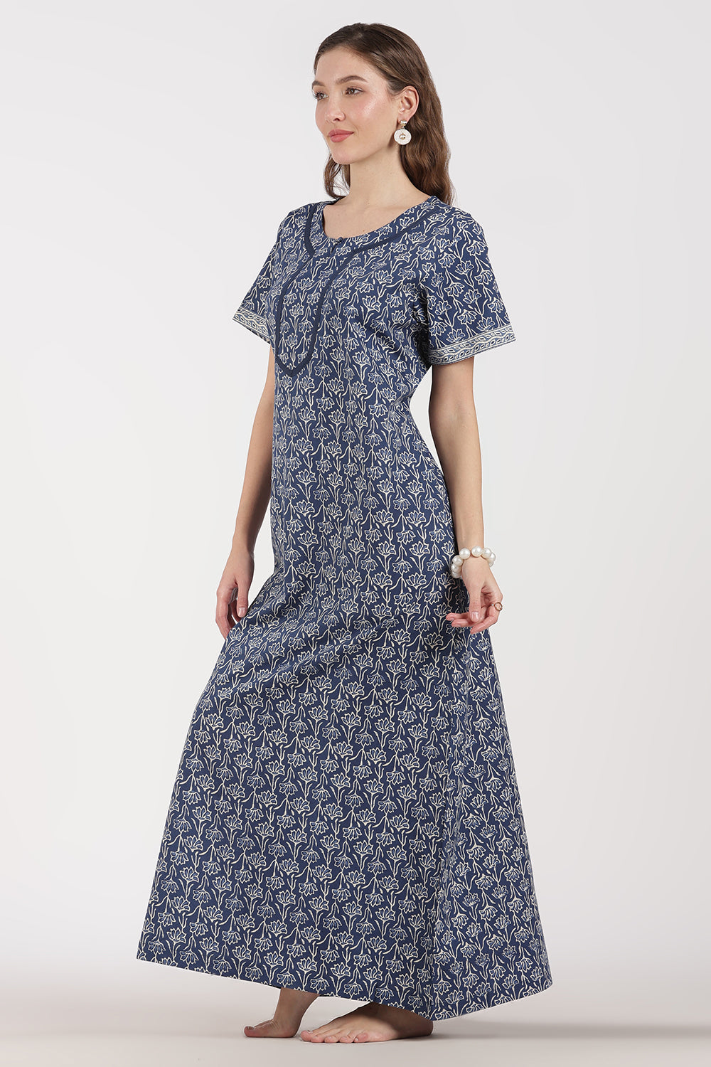 Naidu Hall Women’s Full-Length A-Line Floral Print Cotton Nighty – Round Neck, Keyhole with Button, Contrast Piping & Side Pocket
- NB07