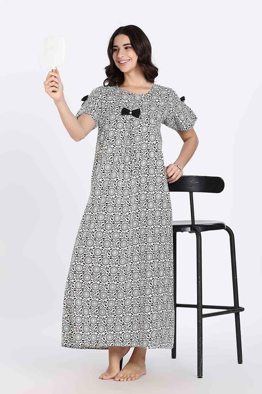 Naidu Hall Women’s Cotton Full-Length Nighty with Bow Tie & Pearl Button – Printed Design
- Black - NA63