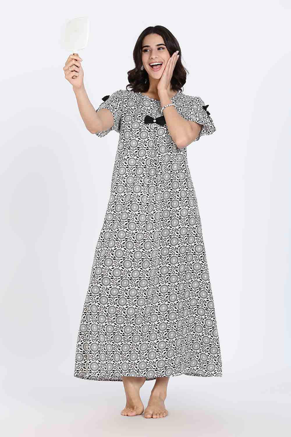 Naidu Hall Women’s Cotton Full-Length Nighty with Bow Tie & Pearl Button – Printed Design
- Black - NA63