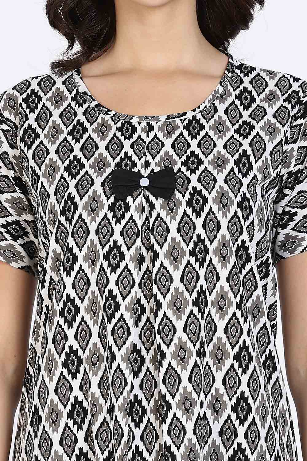 Naidu Hall Women’s Cotton Full-Length Nighty with Bow Tie & Pearl Button – Printed Design
- Black - NA64