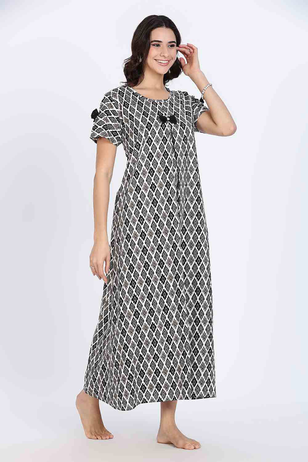 Naidu Hall Women’s Cotton Full-Length Nighty with Bow Tie & Pearl Button – Printed Design
- Black - NA64