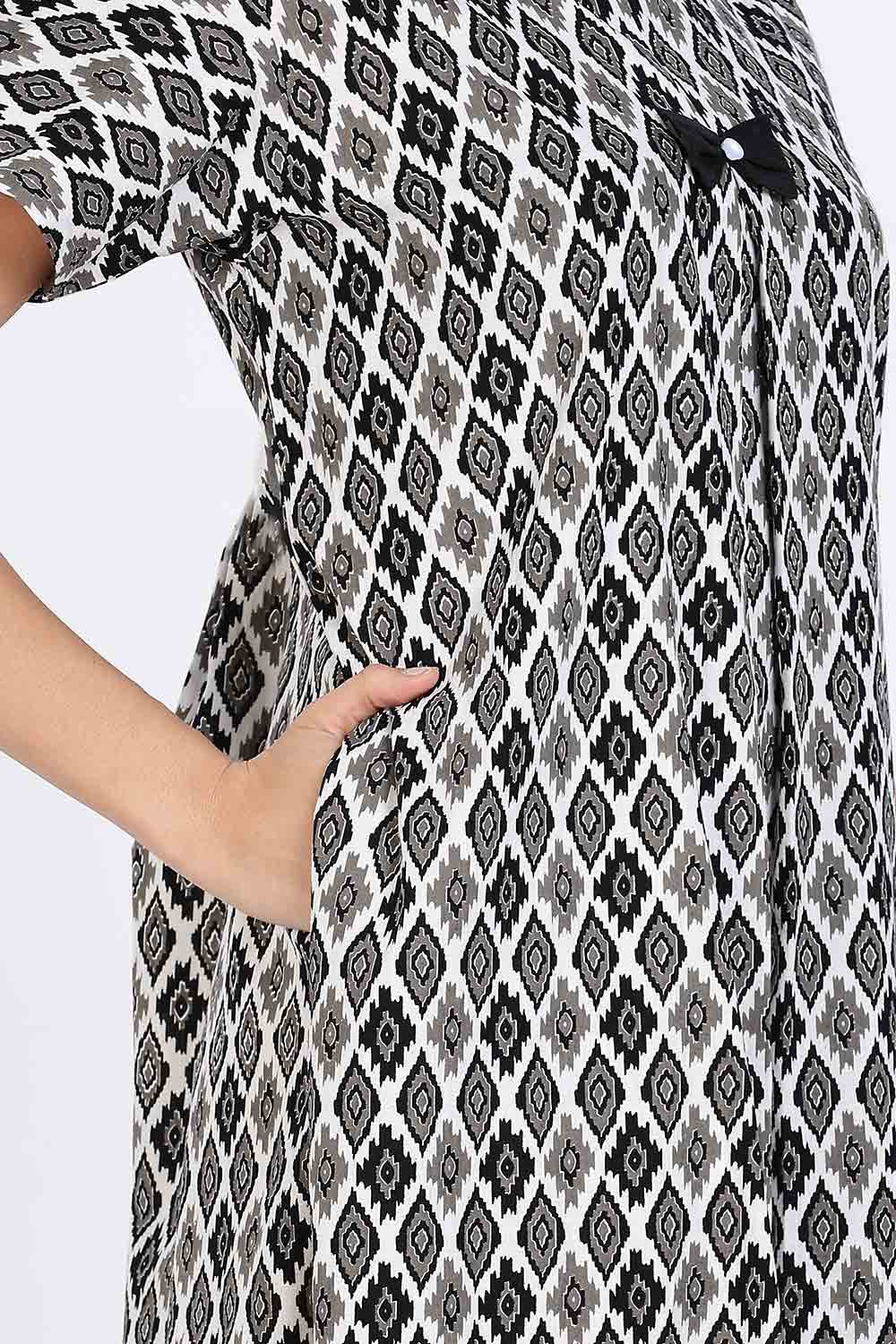 Naidu Hall Women’s Cotton Full-Length Nighty with Bow Tie & Pearl Button – Printed Design
- Black - NA64