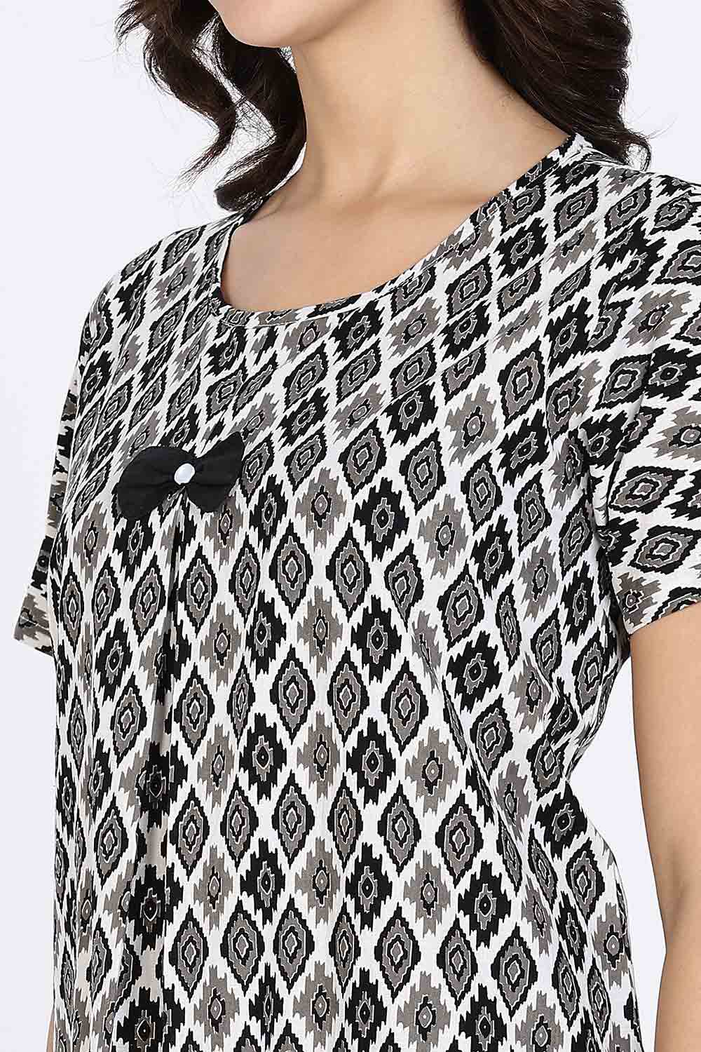 Naidu Hall Women’s Cotton Full-Length Nighty with Bow Tie & Pearl Button – Printed Design
- Black - NA64