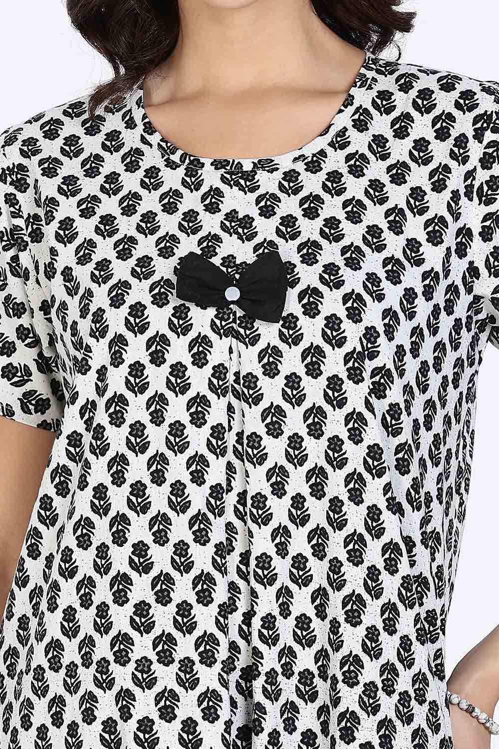 Naidu Hall Women’s Cotton Full-Length Nighty with Bow Tie & Pearl Button – Printed Design
- Black - NA65
