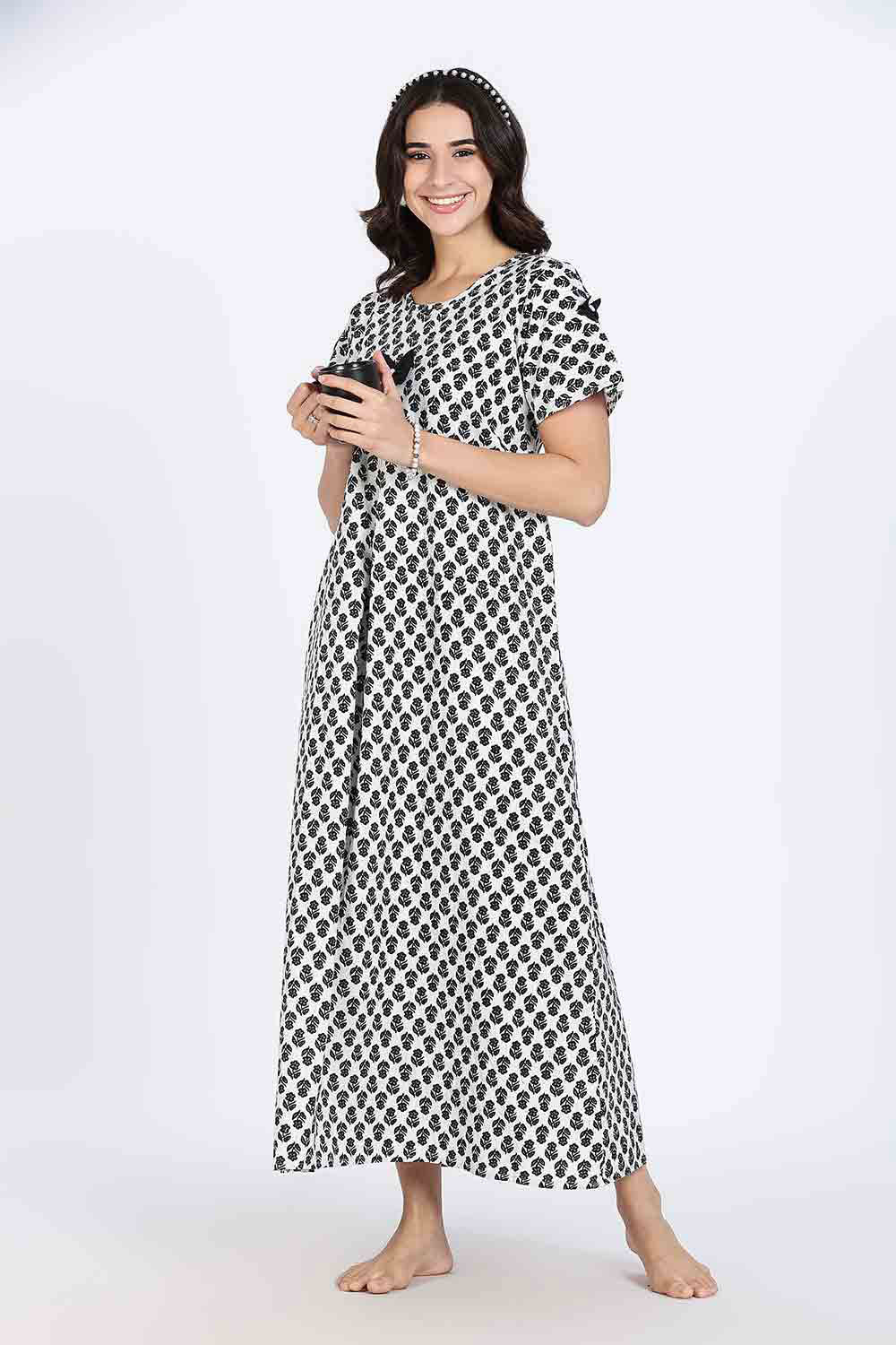 Naidu Hall Women’s Cotton Full-Length Nighty with Bow Tie & Pearl Button – Printed Design
- Black - NA65