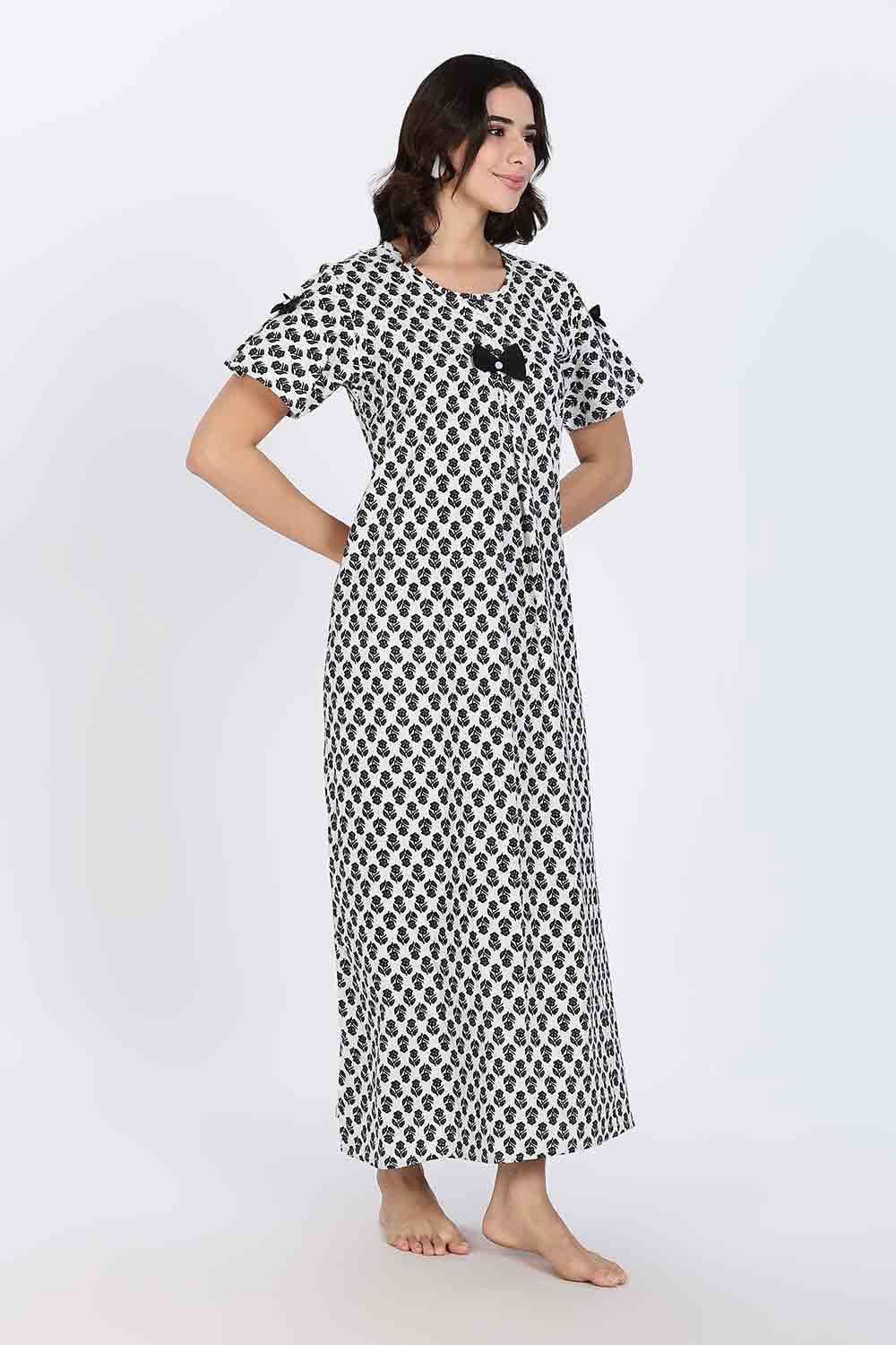 Naidu Hall Women’s Cotton Full-Length Nighty with Bow Tie & Pearl Button – Printed Design
- Black - NA65