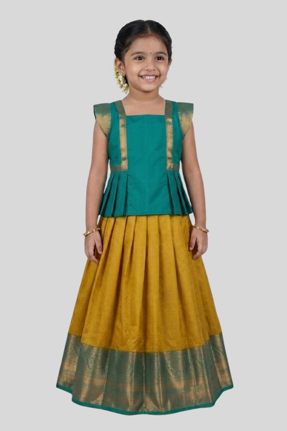 Chittythalli Girls Traditional Pavadai Set | Art Silk Teal Peplum Top with Border Flat Piping & Mini Cap Sleeves | Mustard Yellow Pleated Skirt | Back Open Gold Button | Woven Ethnic Wear for Girls - PS006