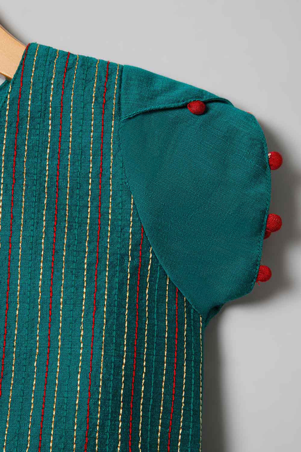 Chittythalli Traditional Pavadai Set with Petal Sleeve and Contrast Fabric Ball Detailings - Green & Red - PS30
