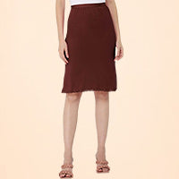 Woman wearing a brown knee-length underskirt