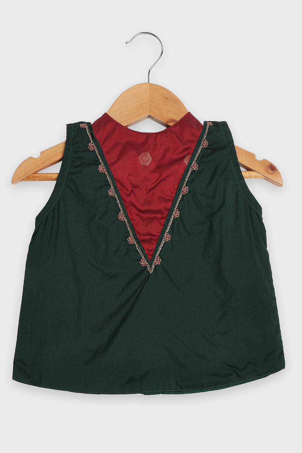 Chittythalli Girls Traditional Pavadai Set | Art Silk Green Sleeveless Top with Red Neck Tie Panel | Minimal Embroidery Hemline | Maroon Knife Pleated Skirt | Woven Ethnic Wear for Girls - PS008