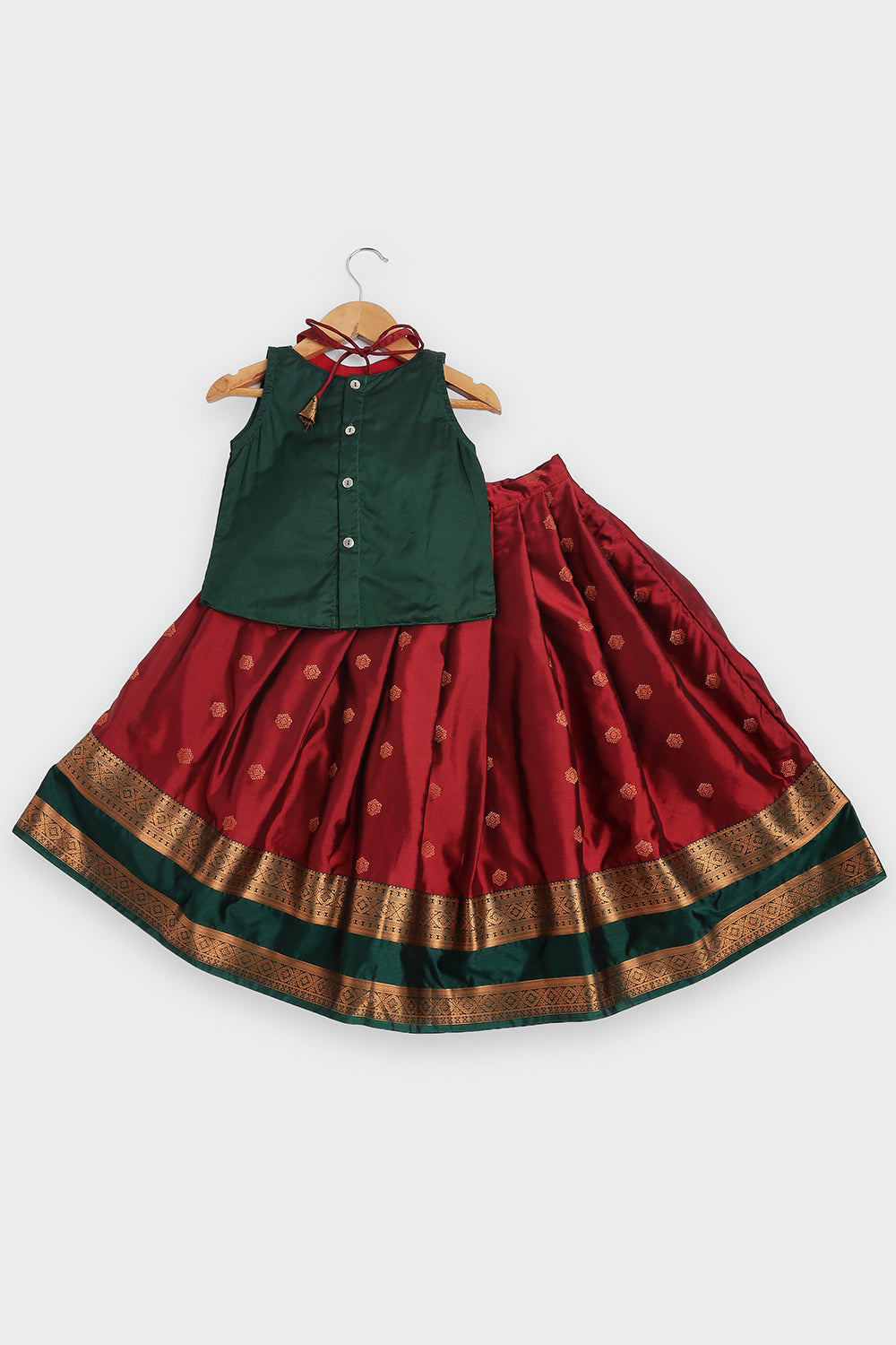 Chittythalli Girls Traditional Pavadai Set | Art Silk Green Sleeveless Top with Red Neck Tie Panel | Minimal Embroidery Hemline | Maroon Knife Pleated Skirt | Woven Ethnic Wear for Girls - PS008